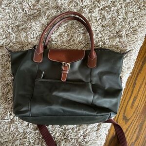 Great bag! Army green with brown leather like handles and trim.  Great condition